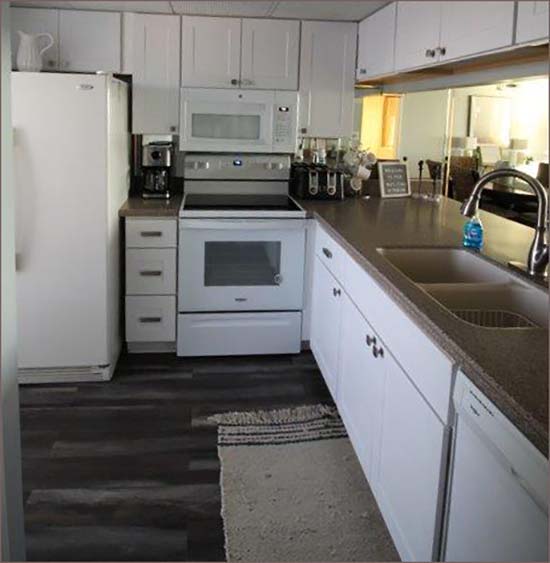 Panama City Beach condo with fully equipped kitchen and 2 door fridge with icemaker.