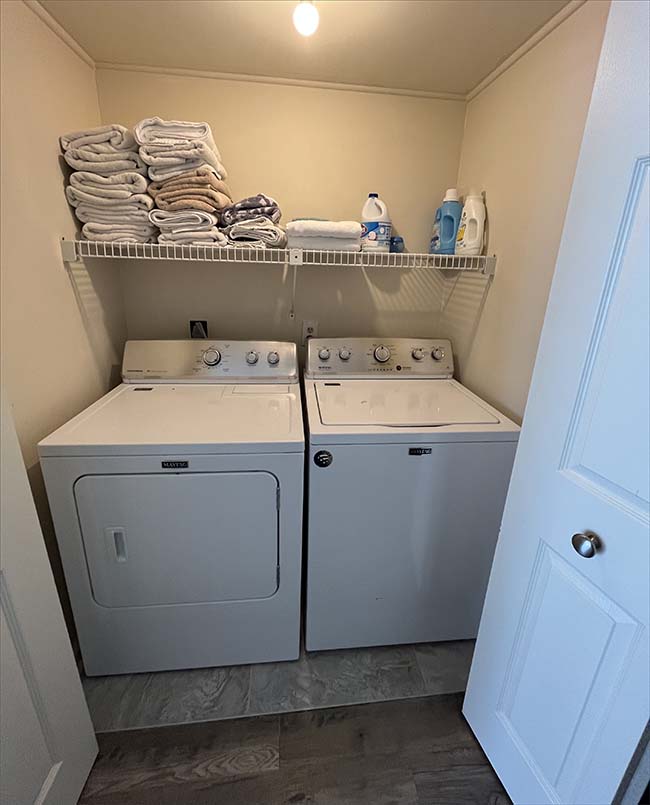 Private full sized washer and dryer.
