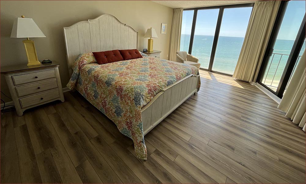 Master bedroom with private balcony and panoramic vistas of the Beach and Gulf.
