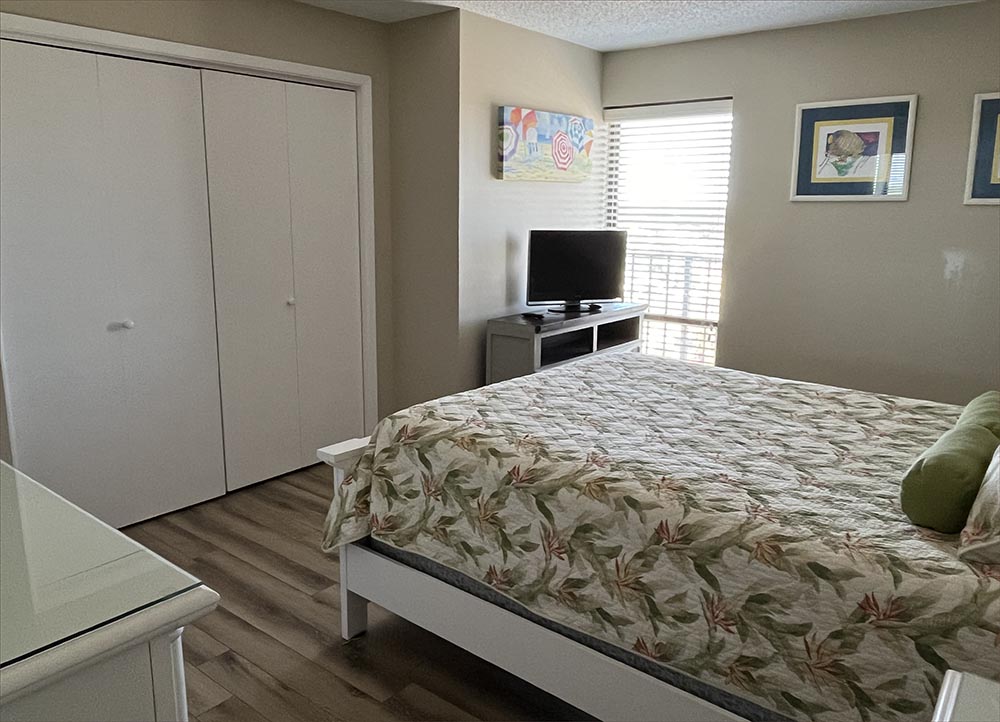 Generous 2nd bedroom includes a queen bed with attached bathroom and walk in shower.