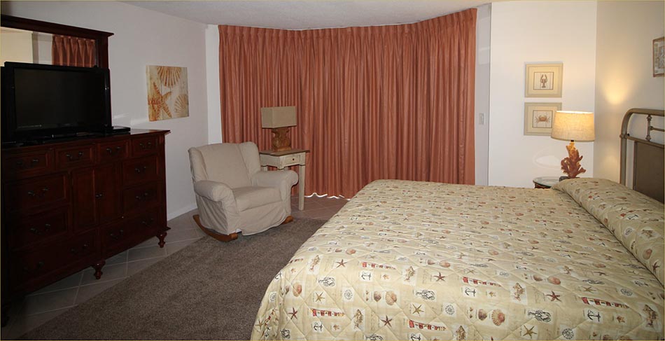 The guest bedroom with king sized bed, and en-suite bathroom.