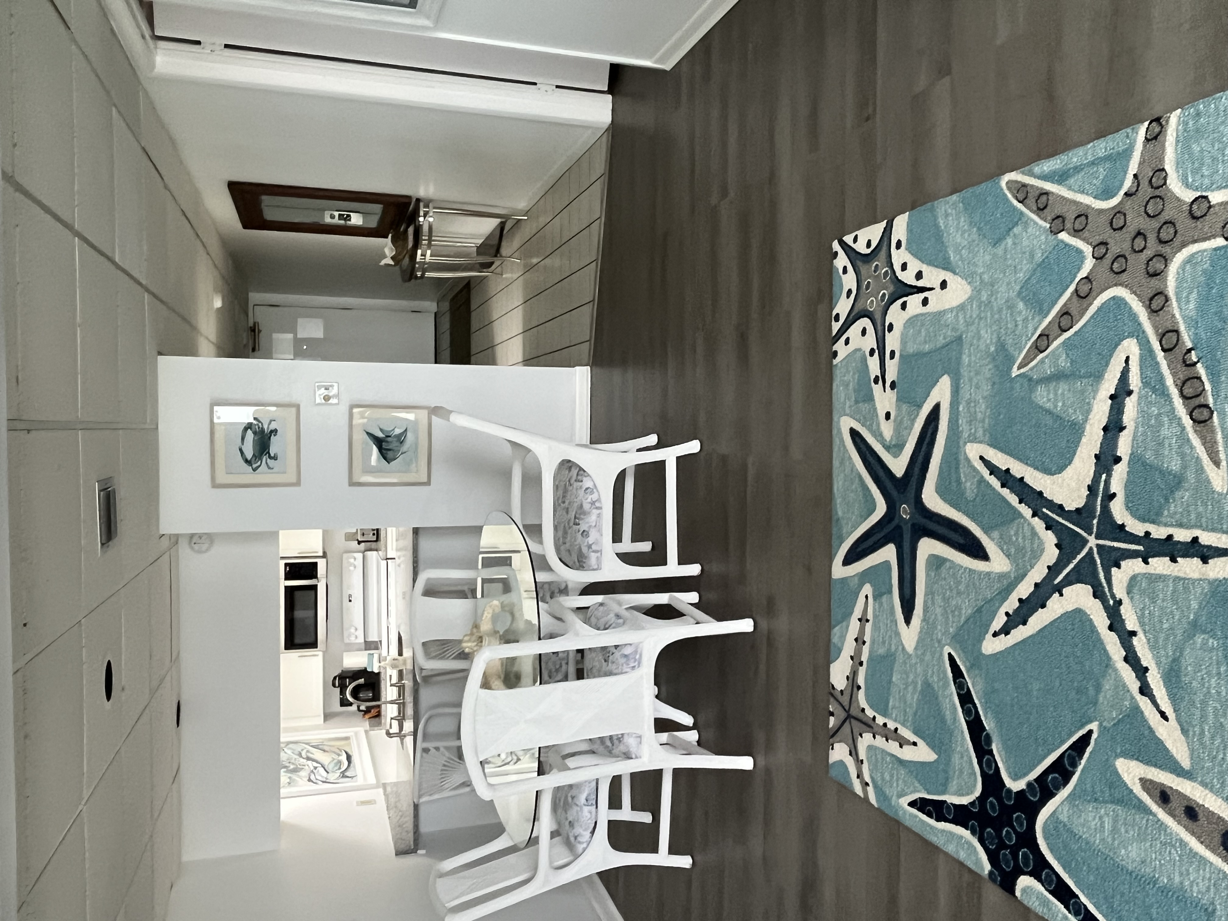 With plump, beachy furnishings and cool tile floors, easy care and carefree holidays for all.