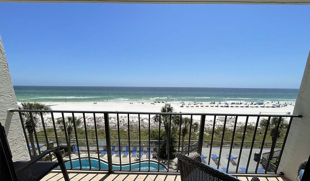 Private balcony with extraordinary views of the beach, gulf and pool area!