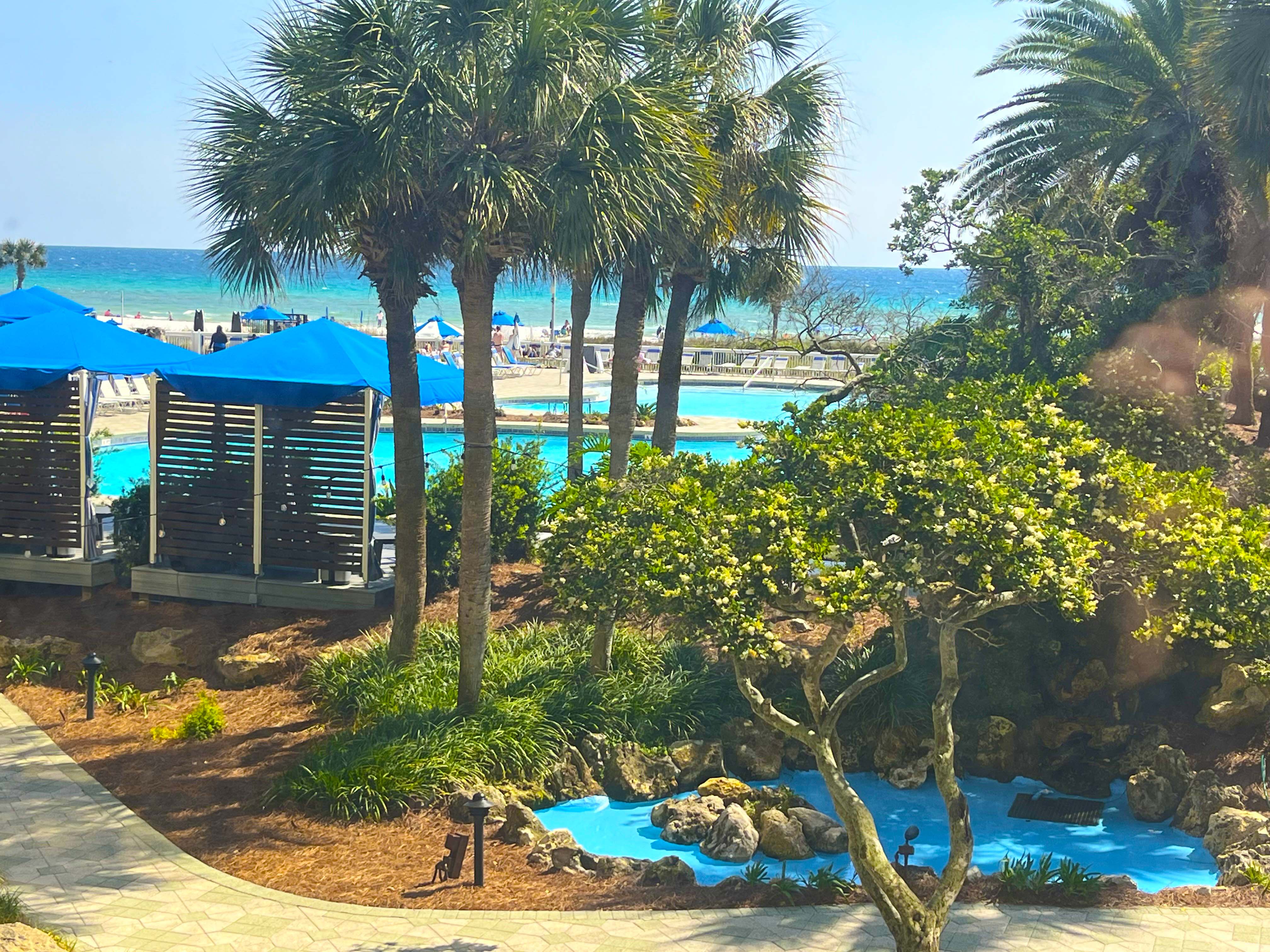 Panama City Beach condo with beachfront pool and sundeck.