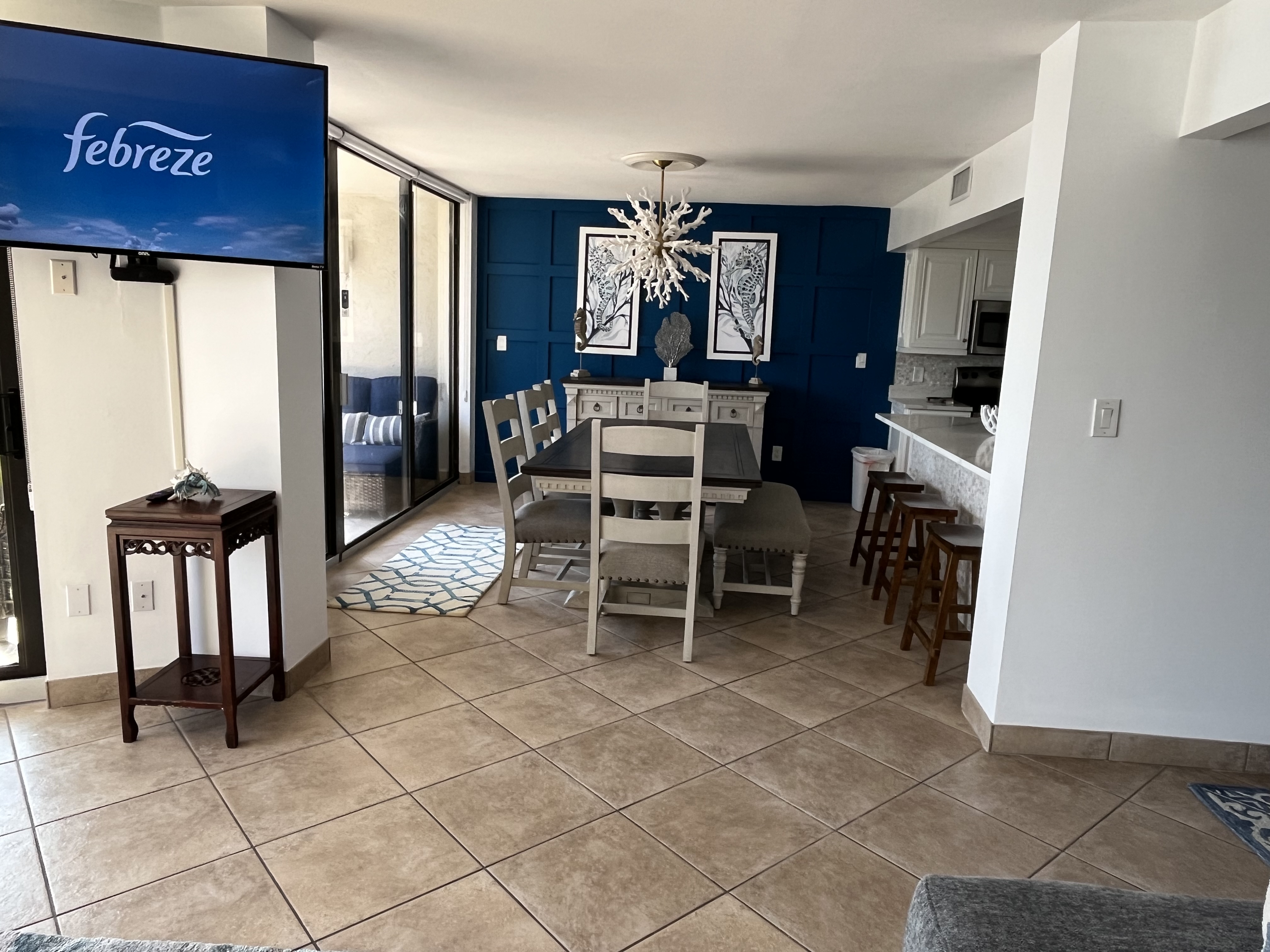 Beach condo includes a dining room with seating for 6.