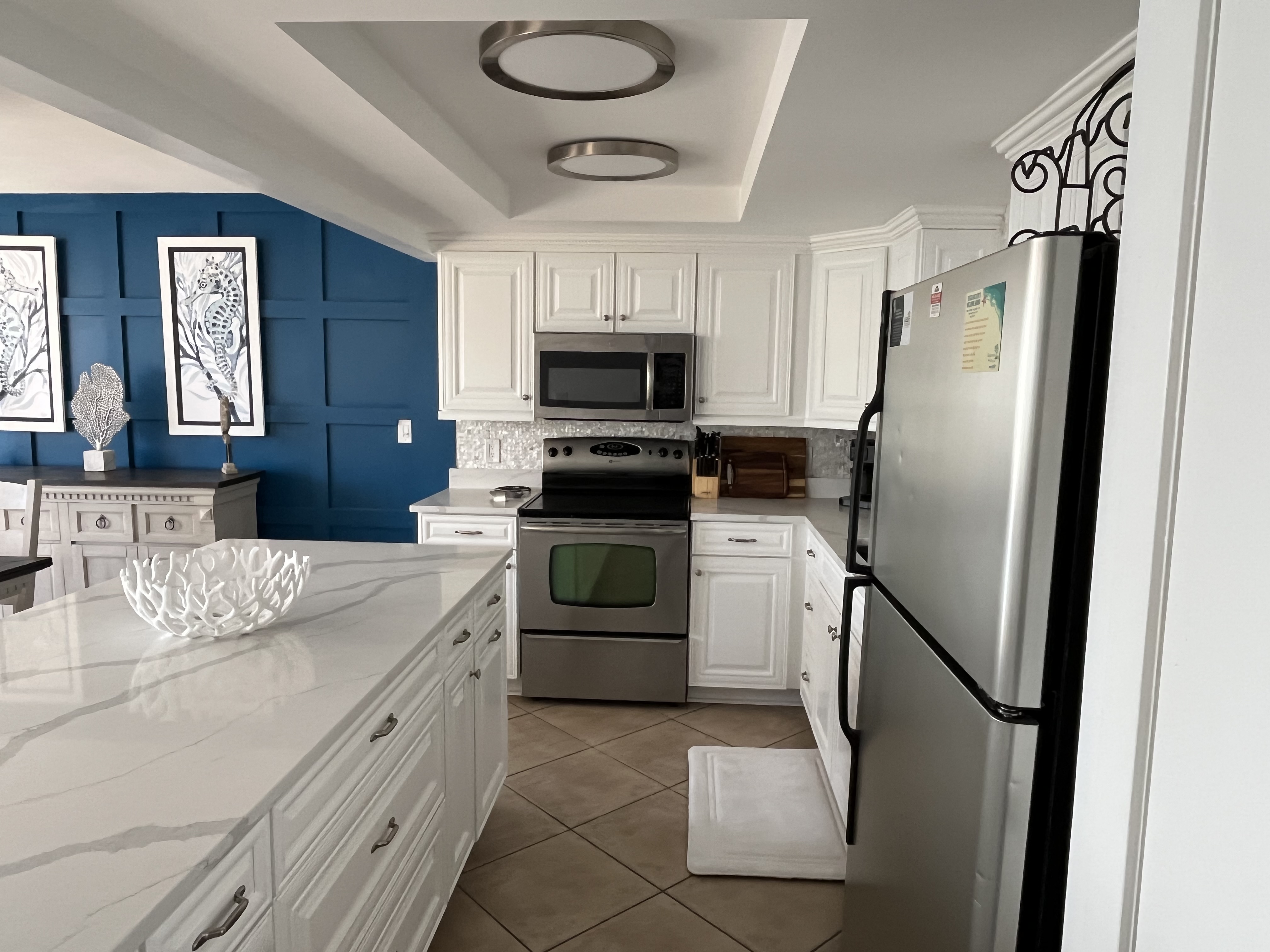 Panama City Beach condo with fully equipped kitchen and 2 door fridge with icemaker.