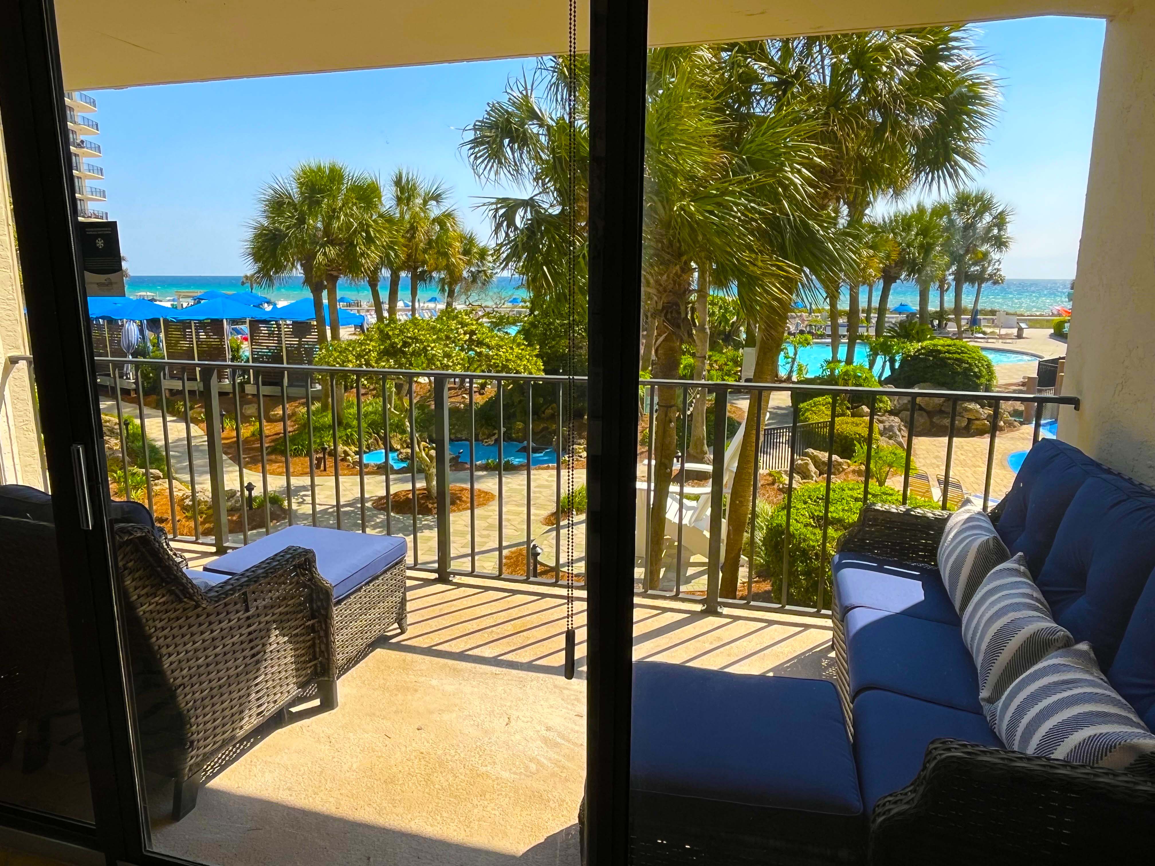 Large private suite with king bed, person flatscreen, comfortable seating and en-suite bathroom. 