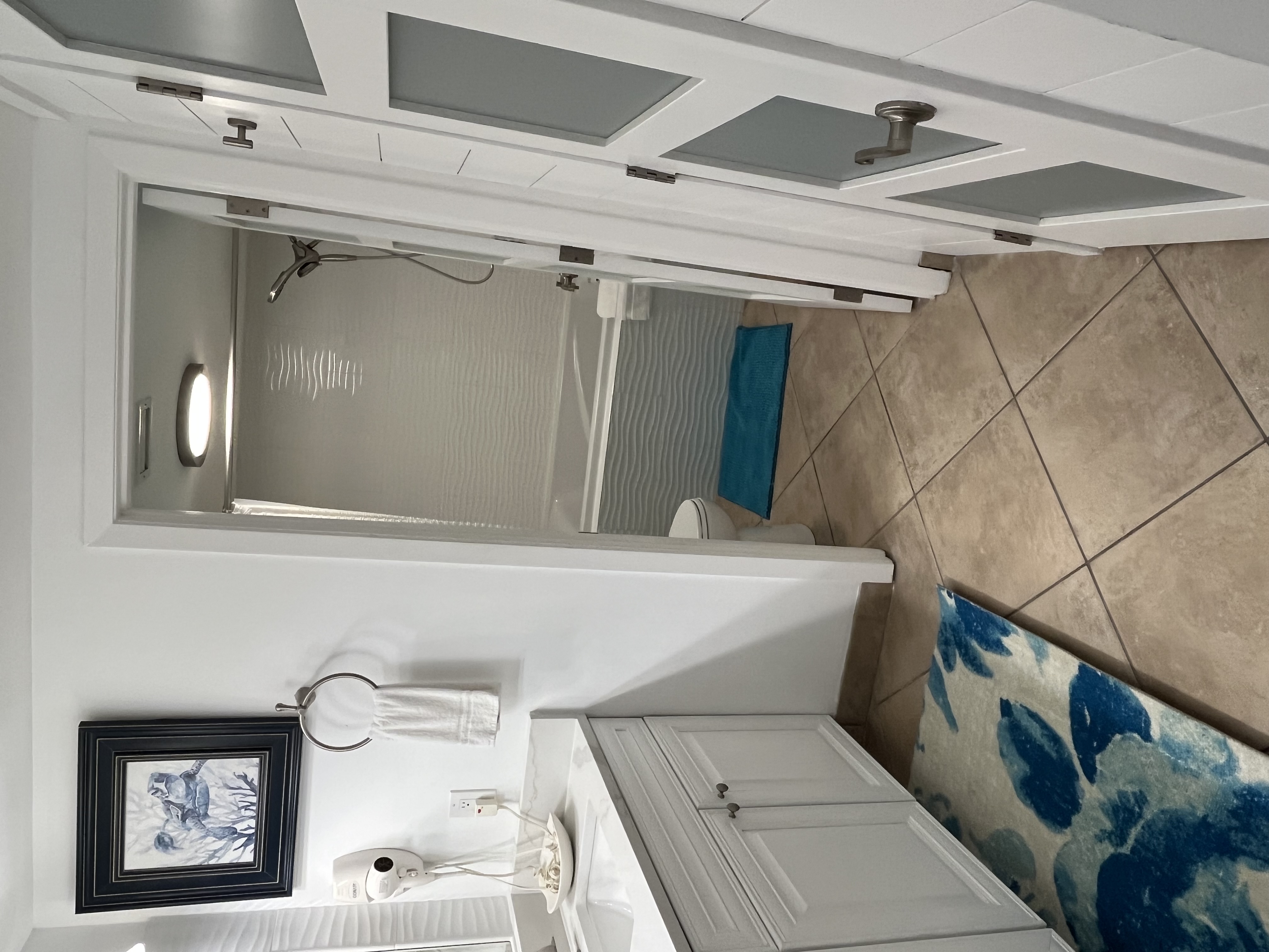 Twin vanieties and room for storage.