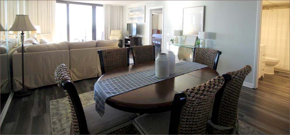 Beach condo includes a dining room with seating for 6.