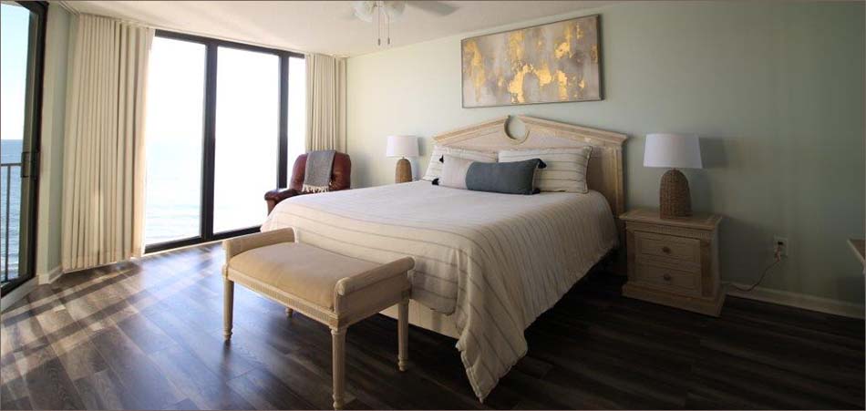 Master bedroom suite with personal access to the private balcony.