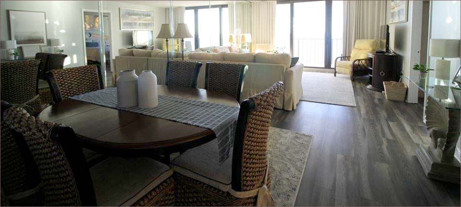 Beach condo includes a dining room with seating for 6.