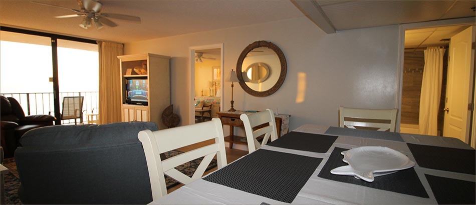 Panama City Beach Condo includes a dining room and separate area.
