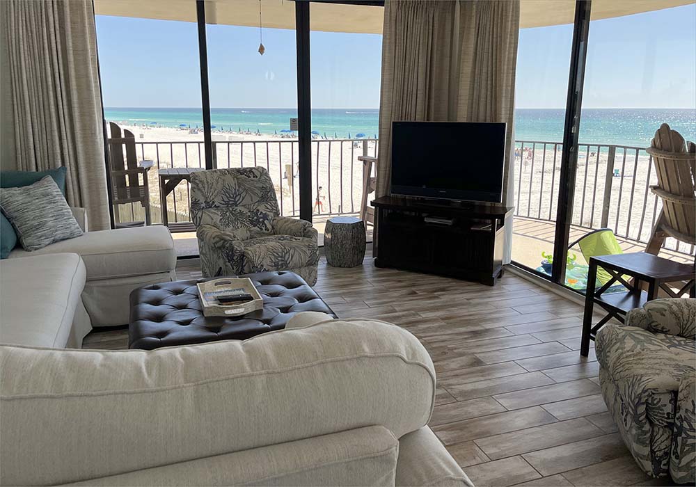 Fresh beachy, comfortable furnishings with cool tile floors and large flat screen TV.