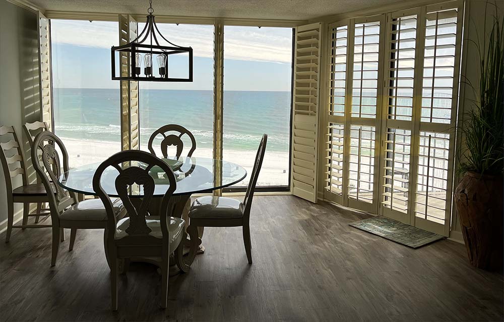 Large 3 bedroom condo with dining room overlooking the beach.