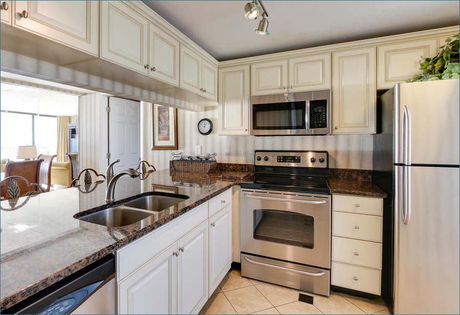 A well appointed and fully equipped kitchen with breakfast bar.
