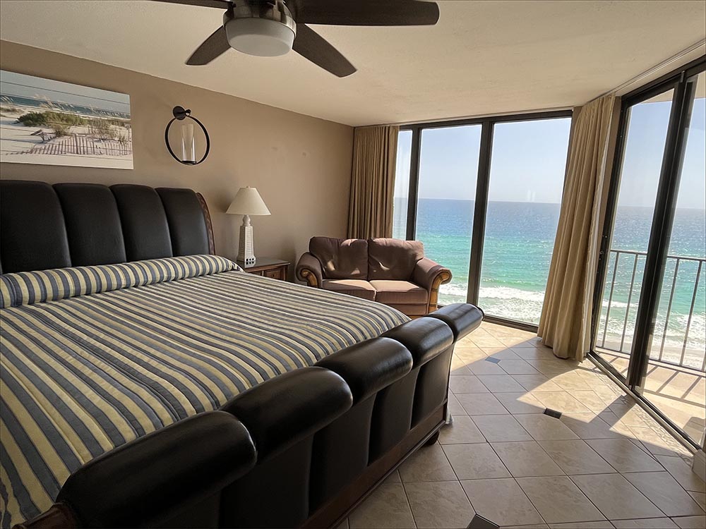 A king sized master bedroom suite overlooking the sugar soft beach and emerald Gulf water.