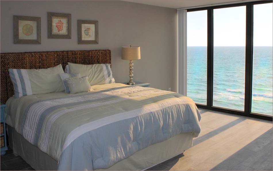 Large master bedroom with unbelievable views of the beach and gulf, right from your king sized bed!