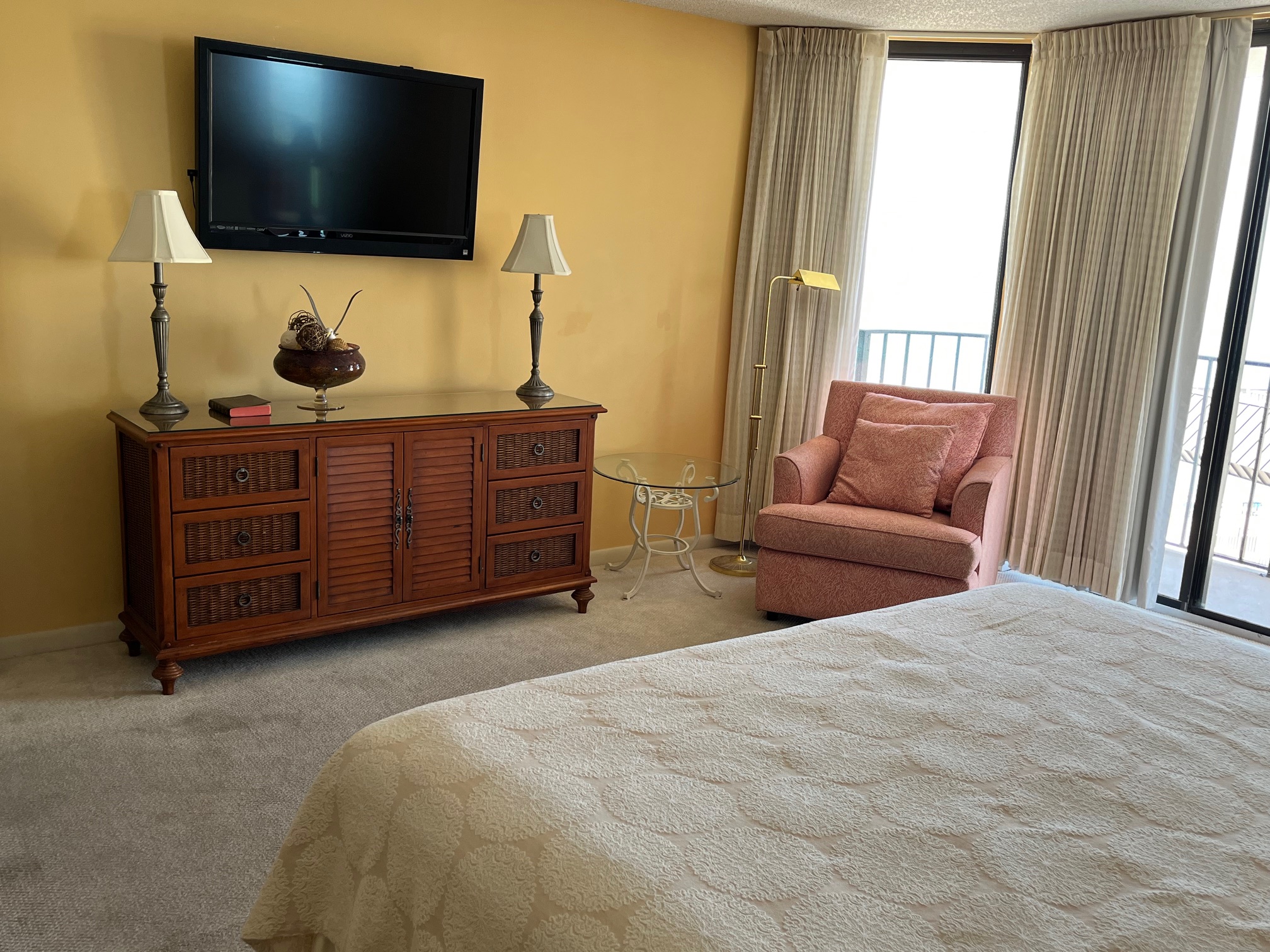 Master bedroom features an en-suite bathroom with twin sinks and countertops.