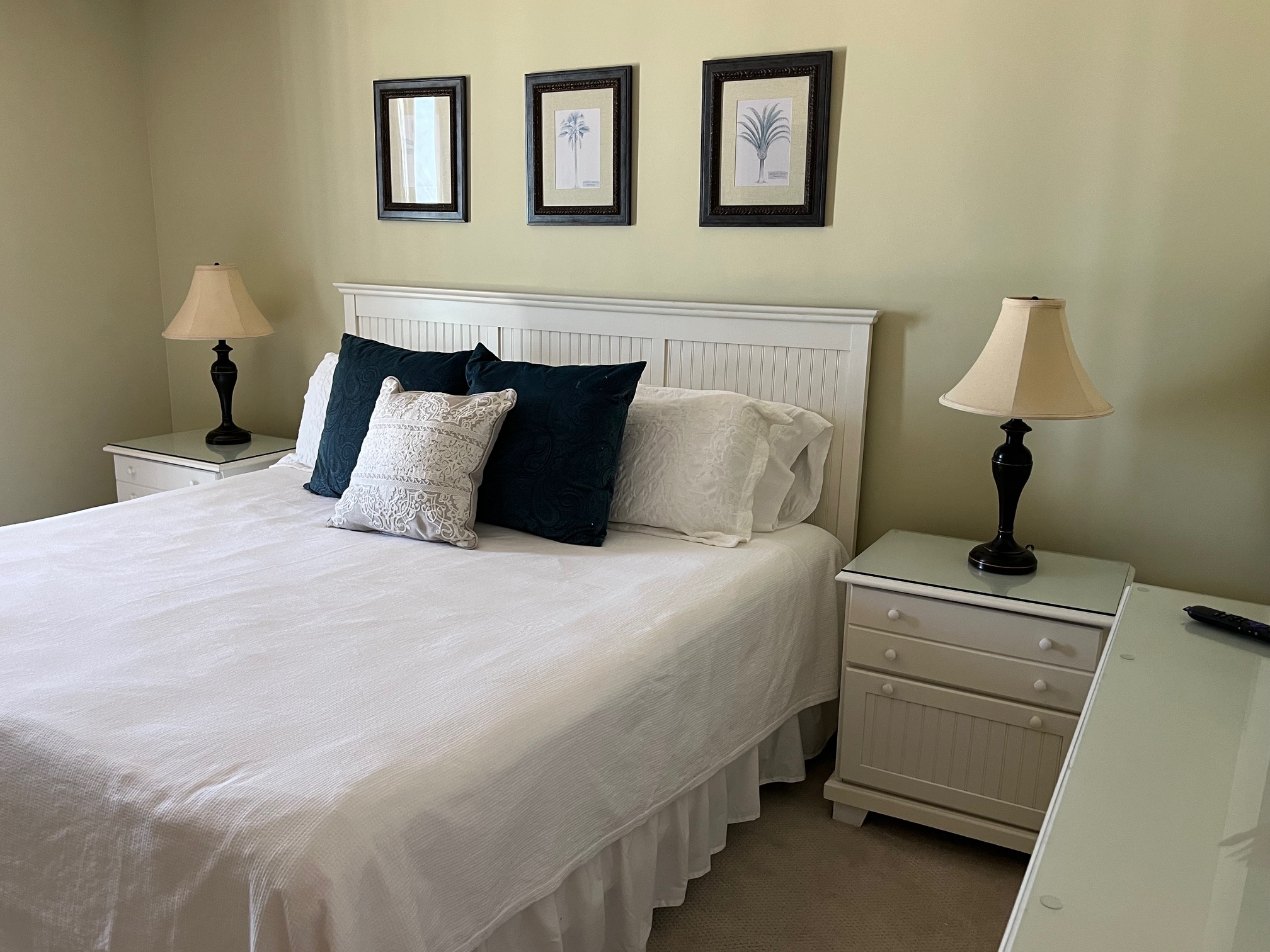 Generous 2nd bedroom includes a queen bed with attached bathroom and walk in shower.
