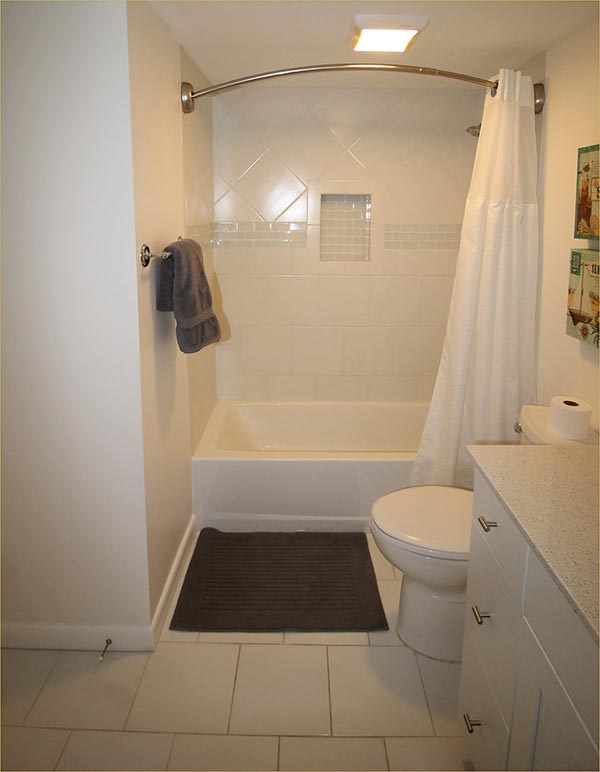 Private bathroom with full shower and tub.
