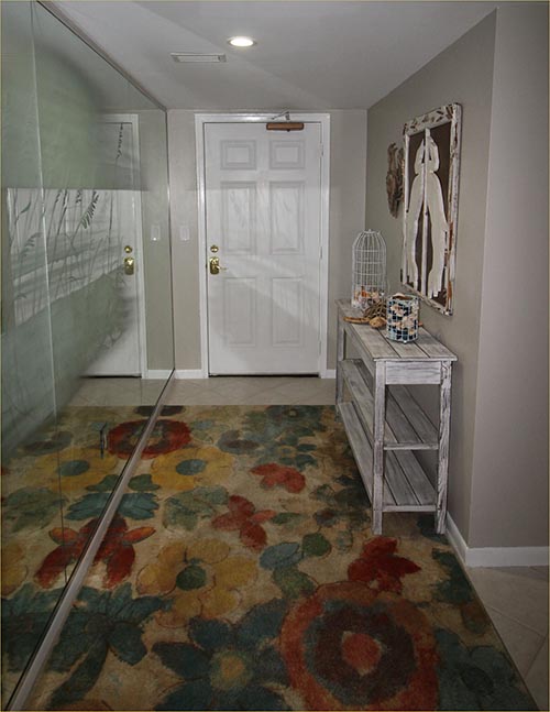 Hallway to the entrance and laundry.