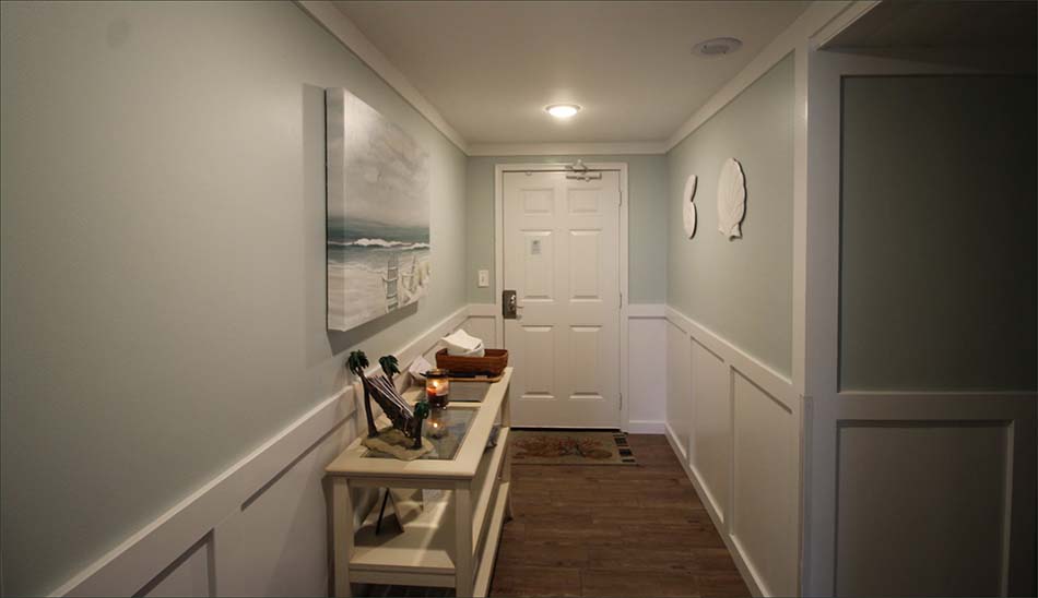 Hallway leading to the third guestroom of this Edgewater luxury condo rental.