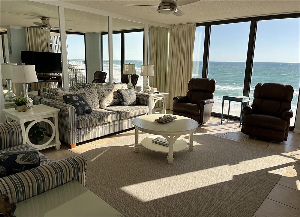 Gulf front living room views of the sugar sand beach.