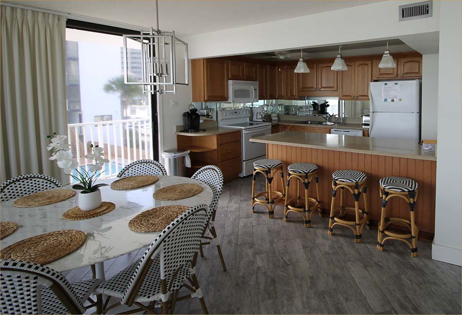 Open and fully appointed kitchen with extra seating breakfast bar all, overlooking the Gulf!