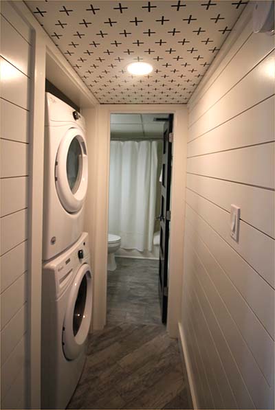 New full sized washer and dryer central to all.