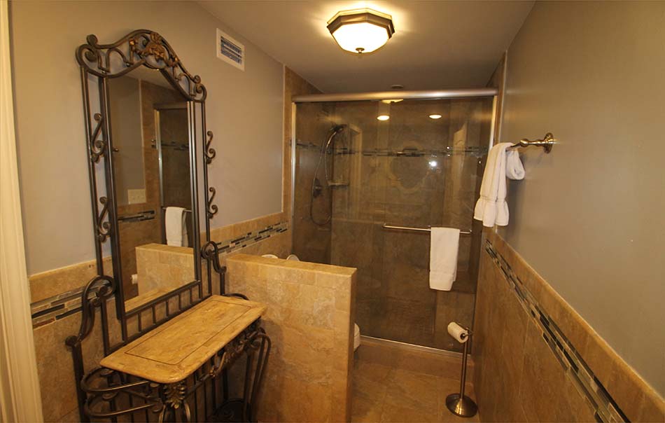 Full private master bathroom with large step in shower and vanity