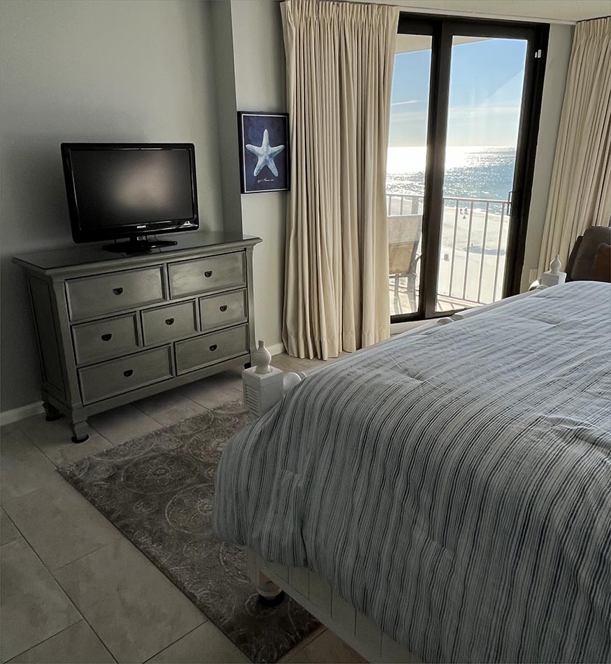 Full master bedroom with two beachfront recliners. 