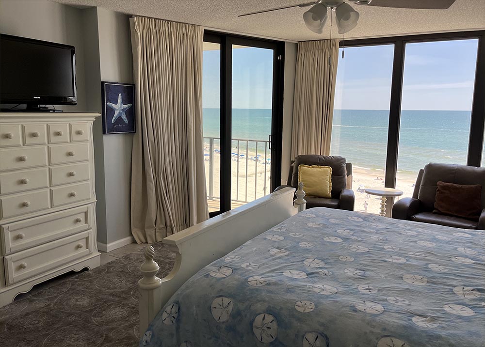 Full master bedroom with two beachfront recliners. 
